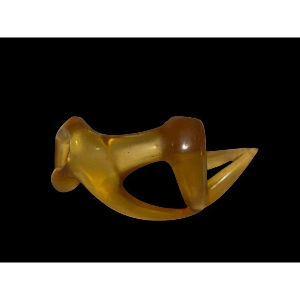 Faceless Lying Down Minimalistic Modern Art StatueYellow Lucite Resin